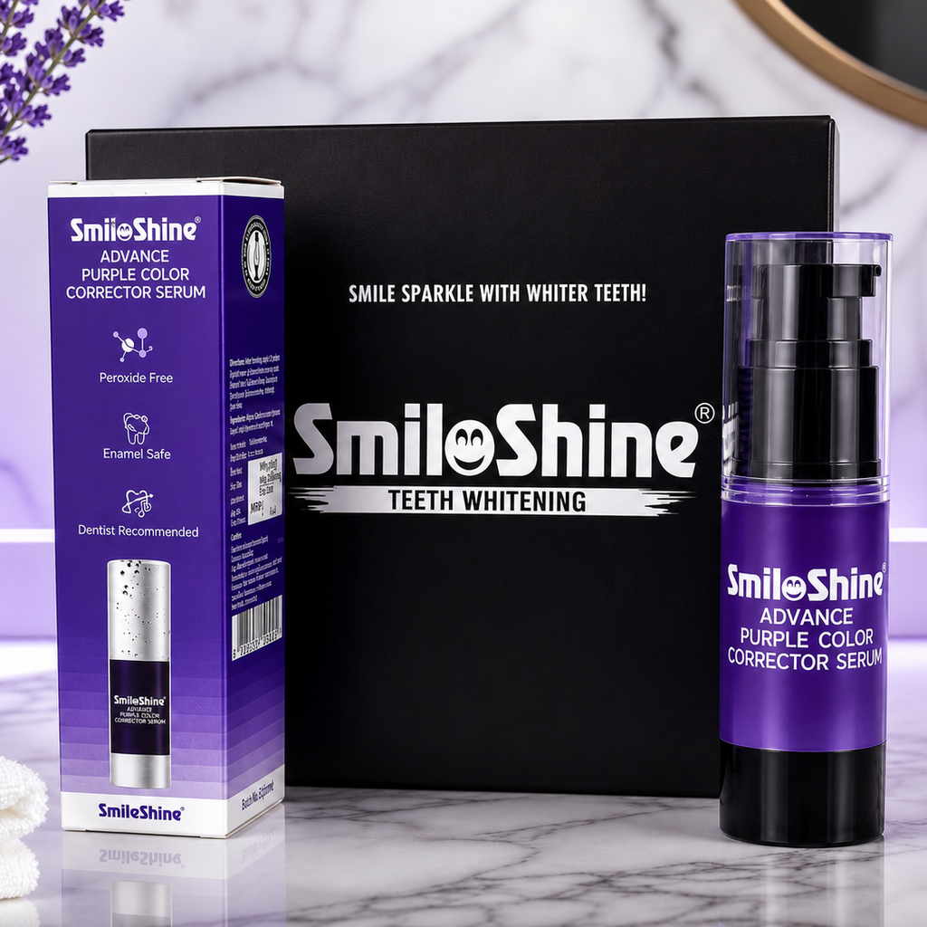 SmileShine Purple Color Corrector Serum shown with its purple and white retail box and the spray bottle, set against a black presentation box on a marble surface with decorative lavender flowers and a white vase.